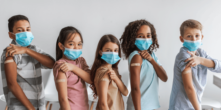 Children with Band-Aid on Arms